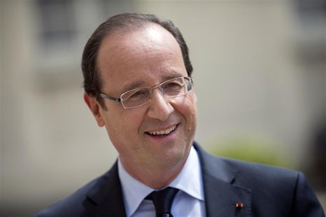 France's President Francois Hollande reacts during a visit of the Elysee Palace in Paris July 19, 2012. REUTERS/Fred/Dufour/Pool France's President Francois Hollande reacts during a visit of the Elysee Palace in Paris July 19, 2012. REUTERS/Fred/Dufour/Pool