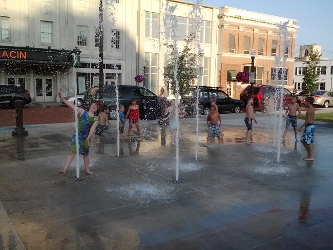 The kids don't mind the wait and they know how to beat the heat.