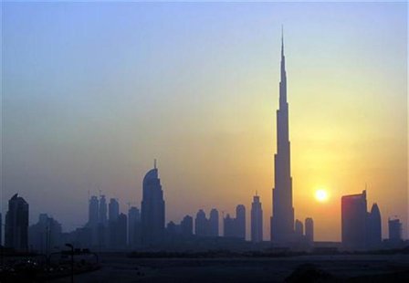 The Burj Khalifa (C) skyscraper is seen as the sun sets over Dubai October 5, 2010. REUTERS/Mosab Omar The Burj Khalifa (C) skyscraper is seen as the sun sets over Dubai October 5, 2010. REUTERS/Mosab Omar