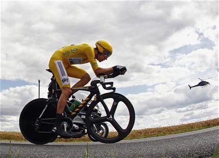 Sky Procycling rider and leader's yellow jersey Bradley Wiggins of Britain cycles during the individual time trial of the 19th stage of the Sky Procycling rider and leader's yellow jersey Bradley Wiggins of Britain cycles during the individual time trial of the 19th stage of the