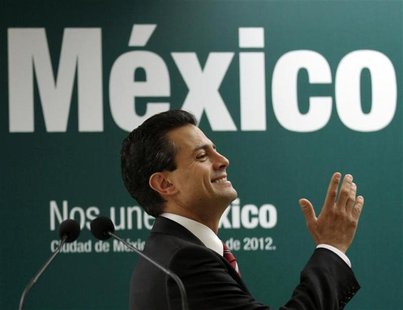 Mexico's President-elect Enrique Pena Nieto gestures during a news conference in Mexico City July 18, 2012. REUTERS/Henry Romero Mexico's President-elect Enrique Pena Nieto gestures during a news conference in Mexico City July 18, 2012. REUTERS/Henry Romero