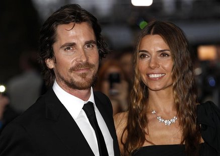 British actor Christian Bale and his wife Sibi pose for photographers as they arrive at the European Premiere of "The Dark Knight Rises" in British actor Christian Bale and his wife Sibi pose for photographers as they arrive at the European Premiere of "The Dark Knight Rises" in
