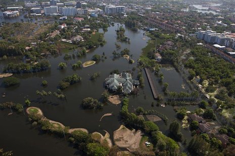 A view of a partially flooded golf course in Bangkok's suburbs November 26, 2011. Thailand's worst floods in 50 years have killed 610 people A view of a partially flooded golf course in Bangkok's suburbs November 26, 2011. Thailand's worst floods in 50 years have killed 610 people