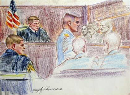 Sergent Adam Holcomb (L), looks on during court-martial proceedings at Fort Bragg, North Carolina in this artist's rendering July 24, 2012. Sergent Adam Holcomb (L), looks on during court-martial proceedings at Fort Bragg, North Carolina in this artist's rendering July 24, 2012.