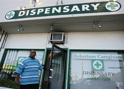 A man stands in front of a medical marijuana dispensary in Los Angeles, California, July 24, 2012. REUTERS/Jonathan Alcorn A man stands in front of a medical marijuana dispensary in Los Angeles, California, July 24, 2012. REUTERS/Jonathan Alcorn