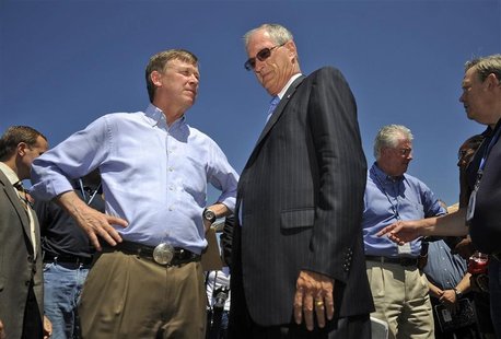 Colorado Governor John Hickenlooper (L) and Aurora Mayor Steve Hogan attend a news conference following the Century 16 Theater shootings in Colorado Governor John Hickenlooper (L) and Aurora Mayor Steve Hogan attend a news conference following the Century 16 Theater shootings in
