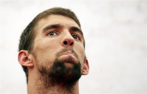 Michael Phelps of the U.S. swimming team reacts during a promotional event in London July 25, 2012. REUTERS/Damir Sagolj Michael Phelps of the U.S. swimming team reacts during a promotional event in London July 25, 2012. REUTERS/Damir Sagolj