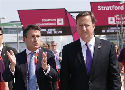 Britain's Prime Minister David Cameron (R) walks with Chairman of the Olympic organising committee (LOCOG) Sebastian Coe at the Olympic Park Britain's Prime Minister David Cameron (R) walks with Chairman of the Olympic organising committee (LOCOG) Sebastian Coe at the Olympic Park