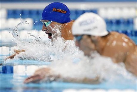 Ryan Lochte (L) swims in the men's 200m individual medley final against Michael Phelps during the U.S. Olympic swimming trials in Omaha, Neb Ryan Lochte (L) swims in the men's 200m individual medley final against Michael Phelps during the U.S. Olympic swimming trials in Omaha, Neb