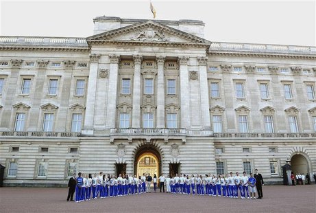 Britain's Prince William, along with Catherine, Duchess of Cambridge and Prince Harry are joined by members of the Team GB Ambition Programm Britain's Prince William, along with Catherine, Duchess of Cambridge and Prince Harry are joined by members of the Team GB Ambition Programm