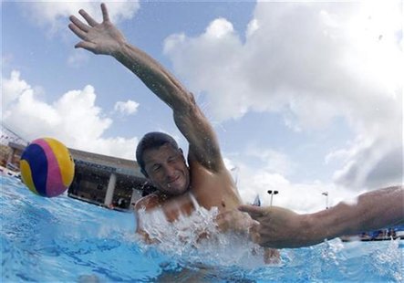 U.S. men's water polo team captain Tony Azevedo trains for the London 2012 Olympics in Thousand Oaks, near Los Angeles, California, April 12 U.S. men's water polo team captain Tony Azevedo trains for the London 2012 Olympics in Thousand Oaks, near Los Angeles, California, April 12