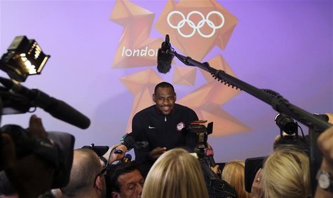 U.S. basketball player LeBron James smiles as he answers a reporter's question during a news conference in the Olympic media centre before t U.S. basketball player LeBron James smiles as he answers a reporter's question during a news conference in the Olympic media centre before t