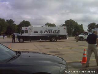 Police are seen staging at Spring Road School in the town of Menasha during a standoff July 27, 2012. (courtesy of FOX 11). Police are seen staging at Spring Road School in the town of Menasha during a standoff July 27, 2012. (courtesy of FOX 11).
