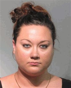 Shellie Zimmerman, wife of George Zimmerman, is pictured in a handout booking photo obtained by Reuters June 12, 2012. REUTERS/Seminole Coun Shellie Zimmerman, wife of George Zimmerman, is pictured in a handout booking photo obtained by Reuters June 12, 2012. REUTERS/Seminole Coun