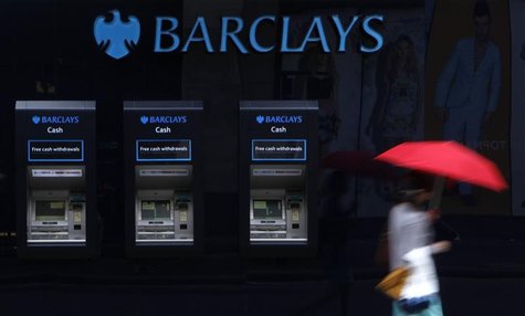 A woman walks past a line of Barclays cash dispensers in central London, June 27 2012. REUTERS/Andrew Winning A woman walks past a line of Barclays cash dispensers in central London, June 27 2012. REUTERS/Andrew Winning