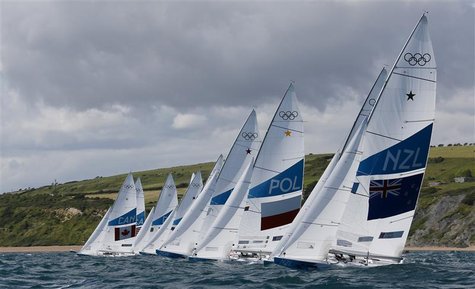 A fleet of Star class keelboats starts during a practice race at the London 2012 Olympic Games in Weymouth and Portland, southern England, J A fleet of Star class keelboats starts during a practice race at the London 2012 Olympic Games in Weymouth and Portland, southern England, J