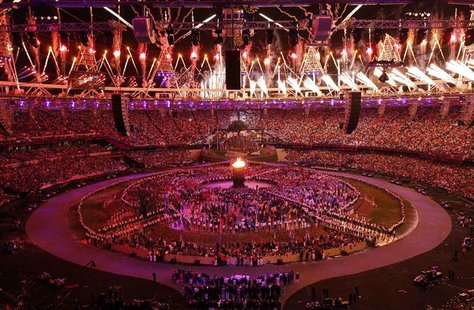 Fireworks explode over the Olympic Stadium after the Olympic Flame was lit during the opening ceremony of the London 2012 Olympic Games July Fireworks explode over the Olympic Stadium after the Olympic Flame was lit during the opening ceremony of the London 2012 Olympic Games July