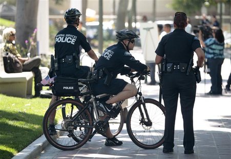 General Services Police officers stand watch as the park surrounding Los Angeles City Hall is reopened seven-and-a-half months after Occupy General Services Police officers stand watch as the park surrounding Los Angeles City Hall is reopened seven-and-a-half months after Occupy
