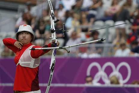 China's Fang Yuting fires an arrow in the women's archery team eliminations at the Lords Cricket Ground during the London 2012 Olympic Games China's Fang Yuting fires an arrow in the women's archery team eliminations at the Lords Cricket Ground during the London 2012 Olympic Games