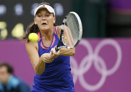 Poland's Agnieszka Radwanska returns to Germany's Julia Goerges in their women's singles tennis match at the All England Lawn Tennis Club du Poland's Agnieszka Radwanska returns to Germany's Julia Goerges in their women's singles tennis match at the All England Lawn Tennis Club du