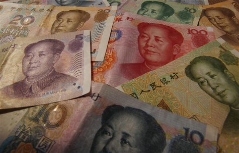 Different values of China's yuan banknotes are seen in this photo illustration taken in Shanghai April 15, 2012. REUTERS/Petar Kujundzic Different values of China's yuan banknotes are seen in this photo illustration taken in Shanghai April 15, 2012. REUTERS/Petar Kujundzic