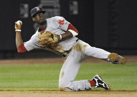 Boston Red Sox shortstop Pedro Ciriaco throws out New York Yankees runner Nick Swisher (not pictured) at second base for an out in the secon Boston Red Sox shortstop Pedro Ciriaco throws out New York Yankees runner Nick Swisher (not pictured) at second base for an out in the secon