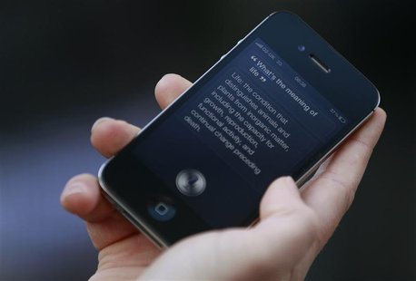 Luke Peters demonstrates Siri, an application which uses voice recognition and detection on the iPhone 4S, outside the Apple store in Covent Luke Peters demonstrates Siri, an application which uses voice recognition and detection on the iPhone 4S, outside the Apple store in Covent