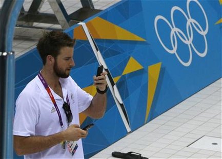 Australian swimmer James Magnussen, the100-metre freestyle world champion, is seen at the Aquatics Centre before the start of the London 201 Australian swimmer James Magnussen, the100-metre freestyle world champion, is seen at the Aquatics Centre before the start of the London 201