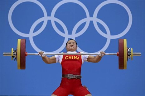 China's Xueying Li lifts 108 Kg on snatch setting new Olympic record on the women's 58Kg Group A weightlifting competition at the London 201 China's Xueying Li lifts 108 Kg on snatch setting new Olympic record on the women's 58Kg Group A weightlifting competition at the London 201