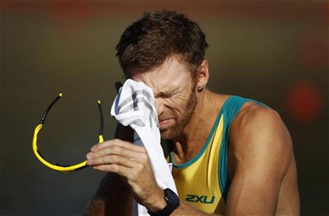 Three-time Olympic gold medal winner Drew Ginn prepares to race as part of Australia's Olympic coxless fours during a training session at th Three-time Olympic gold medal winner Drew Ginn prepares to race as part of Australia's Olympic coxless fours during a training session at th