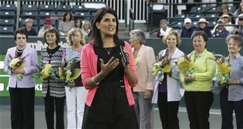 South Carolina Gov. Nikki Haley (front C) address the crowd as she recognizes the "Original Nine", founders of the women's professional tenn South Carolina Gov. Nikki Haley (front C) address the crowd as she recognizes the "Original Nine", founders of the women's professional tenn