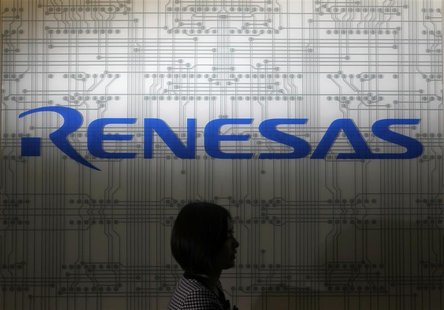 A receptionist passes by the logo of Renesas Electronics Corp at the company's headquarters in Tokyo July 3, 2012. REUTERS/Yuriko Nakao A receptionist passes by the logo of Renesas Electronics Corp at the company's headquarters in Tokyo July 3, 2012. REUTERS/Yuriko Nakao
