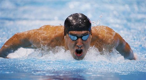 Michael Phelps of the U.S. swims to a first place finish in his men's 200m butterfly semi-final at the London 2012 Olympic Games at the Aqua Michael Phelps of the U.S. swims to a first place finish in his men's 200m butterfly semi-final at the London 2012 Olympic Games at the Aqua