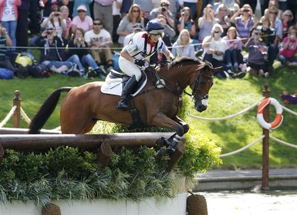 Britain's Zara Phillips rides High Kingdom as she competes in the Eventing Cross Country equestrian event at the London 2012 Olympic Games i Britain's Zara Phillips rides High Kingdom as she competes in the Eventing Cross Country equestrian event at the London 2012 Olympic Games i