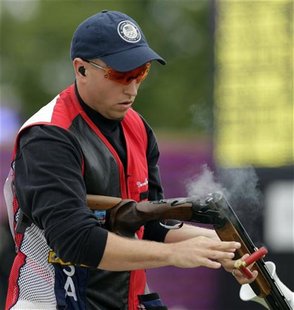 Vincent Hancock of the U.S. discharges the rounds from his rifle during the men's skeet finals at the Royal Artillery Barracks during the Lo Vincent Hancock of the U.S. discharges the rounds from his rifle during the men's skeet finals at the Royal Artillery Barracks during the Lo