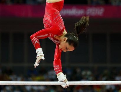 Jordyn Wieber of the U.S. performs on the asymmetric bars during the women's gymnastics team final in the North Greenwich Arena at the Londo Jordyn Wieber of the U.S. performs on the asymmetric bars during the women's gymnastics team final in the North Greenwich Arena at the Londo