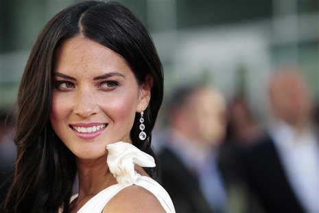 Cast member Olivia Munn poses at the premiere of the HBO television series "The Newsroom" at the Cinerama Dome in Los Angeles, California Ju Cast member Olivia Munn poses at the premiere of the HBO television series "The Newsroom" at the Cinerama Dome in Los Angeles, California Ju