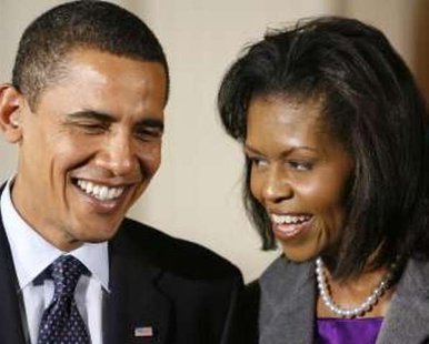 U.S. President Barack Obama and first Lady Michelle Obama greet guests at a signing ceremony of the $32.8 billion expansion of the State Children's Health Insurance Program, or SCHIP, at the White House in Washington February 4, 2009. The SCHIP program aims to help working families who cannot afford private health insurance but earn too much to qualify for Medicaid healthcare coverage for the poor. REUTERS/Kevin Lamarque U.S. President Barack Obama and first Lady Michelle Obama greet guests at a signing ceremony of the $32.8 billion expansion of the State Children's Health Insurance Program, or SCHIP, at the White House in Washington February 4, 2009. The SCHIP program aims to help working families who cannot afford private health insurance but earn too much to qualify for Medicaid healthcare coverage for the poor. REUTERS/Kevin Lamarque