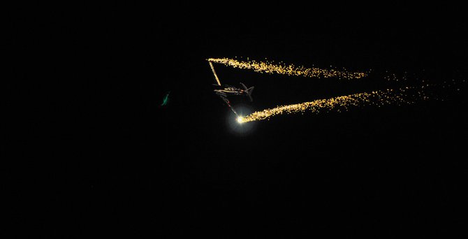 They had fireworks coming out of the tips of the wings on the planes! That's how you can see these amazing planes AT NIGHT!
