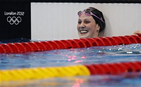 Missy Franklin of the U.S. celebrates after winning the women's 100m backstroke final at the London 2012 Olympic Games at the Aquatics Centr Missy Franklin of the U.S. celebrates after winning the women's 100m backstroke final at the London 2012 Olympic Games at the Aquatics Centr