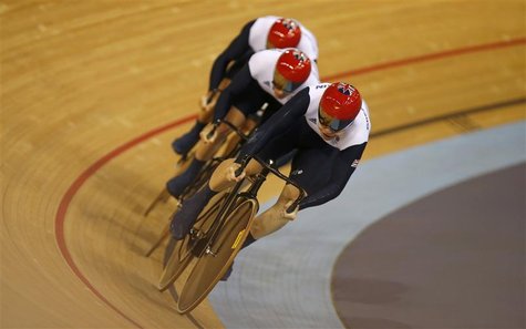 Britain's Philip Hindes, Chris Hoy and Jason Kenny compete in the track cycling men's team sprint qualifying heats at the Velodrome during t Britain's Philip Hindes, Chris Hoy and Jason Kenny compete in the track cycling men's team sprint qualifying heats at the Velodrome during t