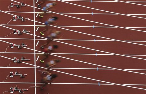 Athletes start off in the women's heptathlon 100m hurdles heat during the London 2012 Olympic Games at the Olympic Stadium August 3, 2012. R Athletes start off in the women's heptathlon 100m hurdles heat during the London 2012 Olympic Games at the Olympic Stadium August 3, 2012. R
