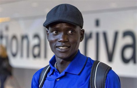 Marathon runner Guor Marial arrives at Heathrow Airport for the London 2012 Olympic Games August 3, 2012. Marial is competing as an independ Marathon runner Guor Marial arrives at Heathrow Airport for the London 2012 Olympic Games August 3, 2012. Marial is competing as an independ