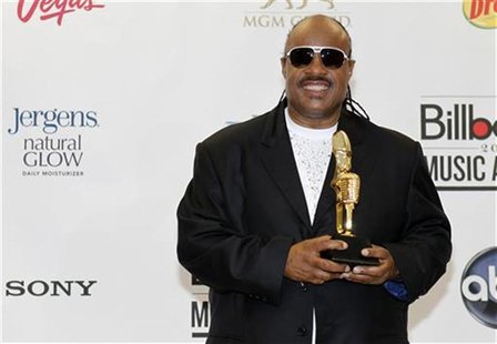 Stevie Wonder poses with the Billboard Icon Award backstage at the 2012 Billboard Music Awards held at the MGM Grand Garden Arena in Las Veg Stevie Wonder poses with the Billboard Icon Award backstage at the 2012 Billboard Music Awards held at the MGM Grand Garden Arena in Las Veg