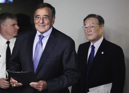 U.S. Defense Secretary Leon Panetta (L) and Japan's Defense Minister Satoshi Morimoto arrive at a joint news conference after their meeting U.S. Defense Secretary Leon Panetta (L) and Japan's Defense Minister Satoshi Morimoto arrive at a joint news conference after their meeting