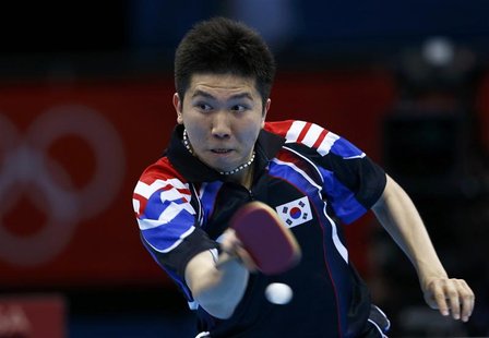 REFILE - REMOVING UNNECESSARY REFERENCE TO POSITION South Korea's Ryu Seungmin hits a return to North Korea's Kim Hyok-bong in their men's t REFILE - REMOVING UNNECESSARY REFERENCE TO POSITION South Korea's Ryu Seungmin hits a return to North Korea's Kim Hyok-bong in their men's t