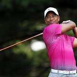 Tiger Woods of the U.S. watches his tee shot on the second hole during the third round of the WGC-Bridgestone Invitational golf tournament i