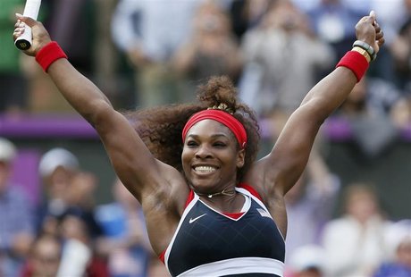 Serena Williams of the U.S. celebrates after winning the women's singles gold medal match against Russia's Maria Sharapova at the All Englan Serena Williams of the U.S. celebrates after winning the women's singles gold medal match against Russia's Maria Sharapova at the All Englan
