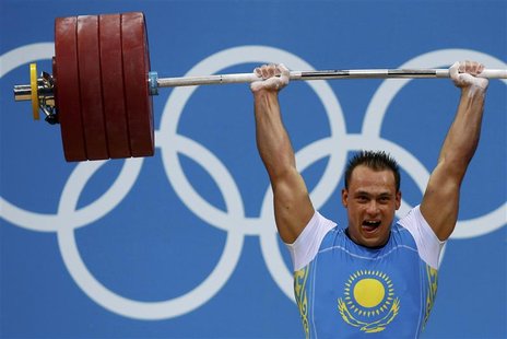 Kazakhstan's Ilya Ilyin lifts on the men's 94Kg group A weightlifting competition at the ExCel venue at the London 2012 Olympic Games August Kazakhstan's Ilya Ilyin lifts on the men's 94Kg group A weightlifting competition at the ExCel venue at the London 2012 Olympic Games August