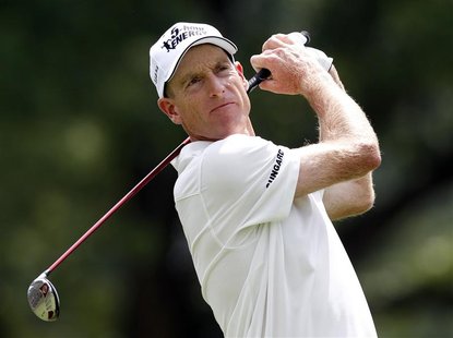 Jim Furyk of the U.S. watches his tee shot on the third hole during the third round of the WGC-Bridgestone Invitational golf tournament in A Jim Furyk of the U.S. watches his tee shot on the third hole during the third round of the WGC-Bridgestone Invitational golf tournament in A